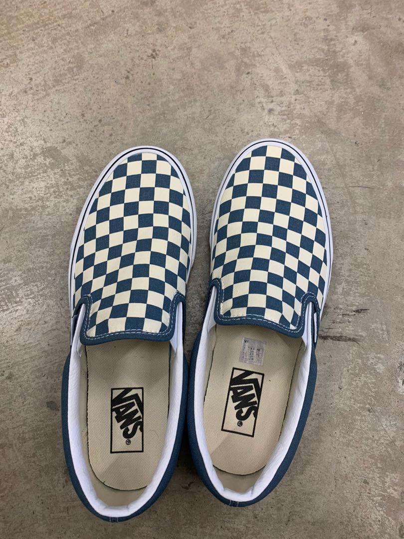 Checkered blue store and white vans