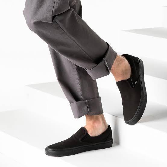 full black slip on vans