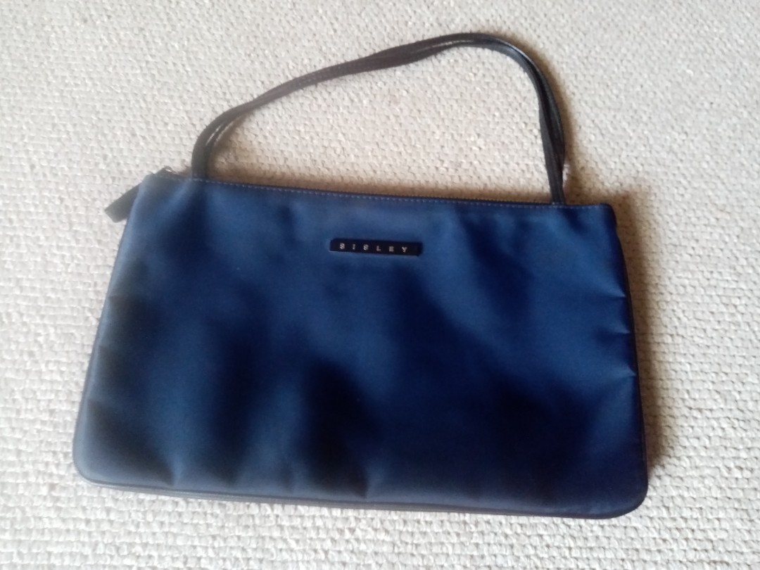 Sisley pochette, Women's Fashion, Bags \u0026 Wallets, Purses \u0026 Pouches on  Carousell