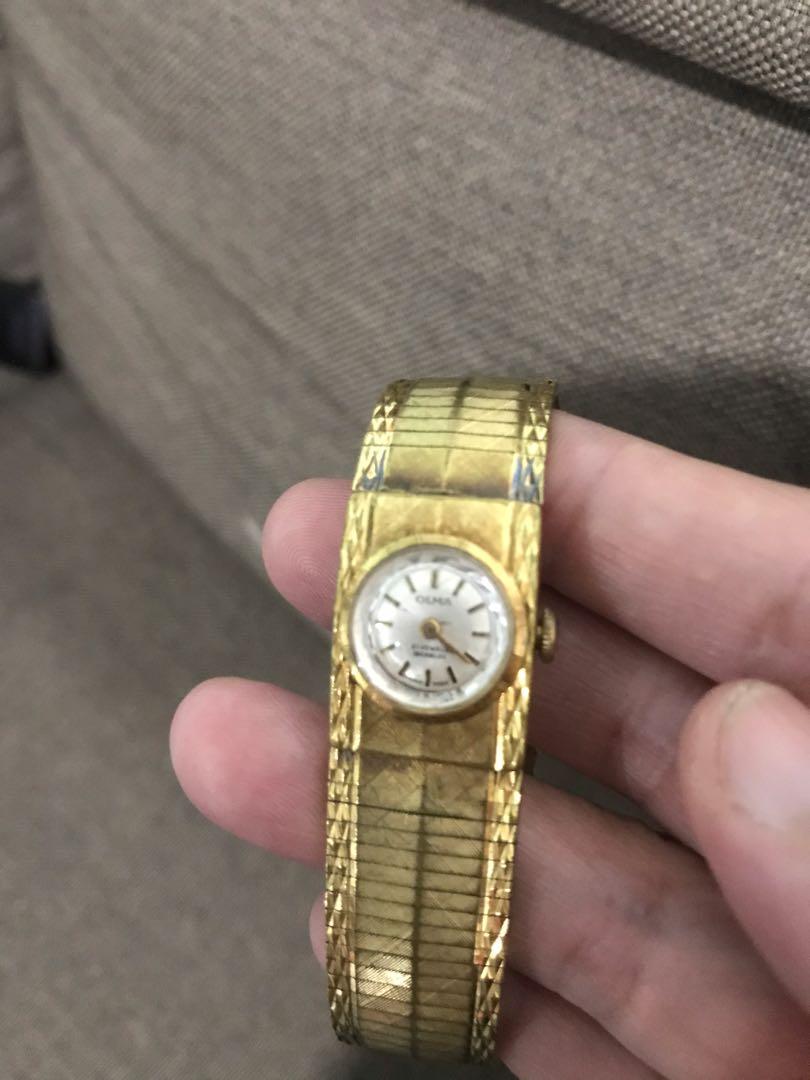 Olma gold watch hotsell