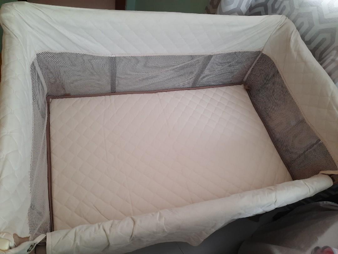 Baby first Co sleeper crib / playpen (Category: Cots & Cribs) located in Las Pinas. Submitted by closetful.ph (Listing ID 1029972378, Image 3). Description: VGUC. no flaw. Nice color brown and cream. One side can be slide down to work as co-sleeper. size 30"x36"x24" (HxLxW) last price posted.