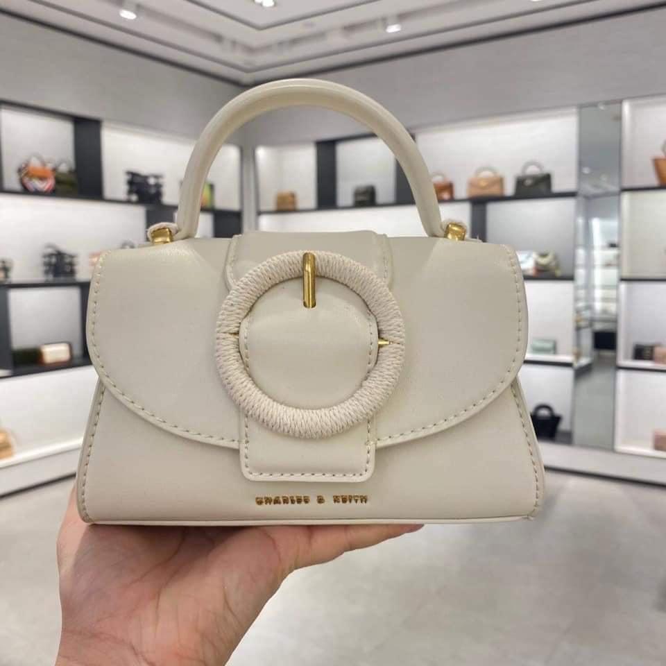 Woven buckle sale top handle bag