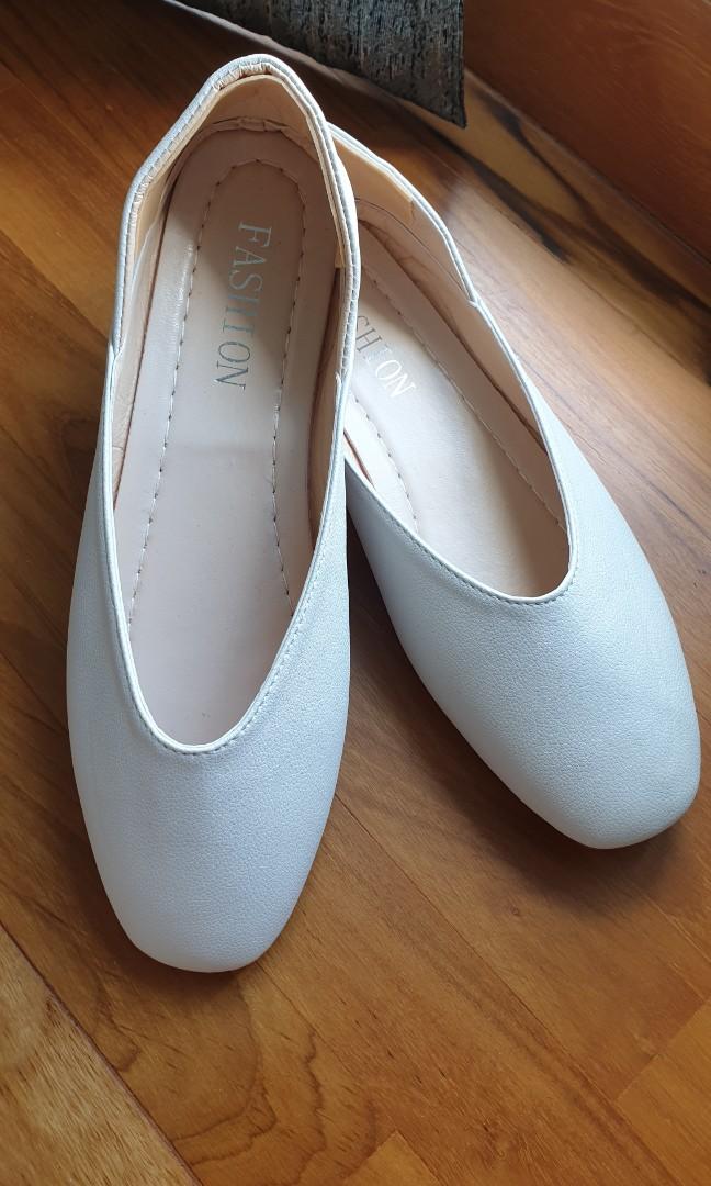 white flat ballet shoes