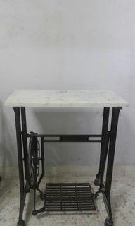 White Marble sewing machine table.