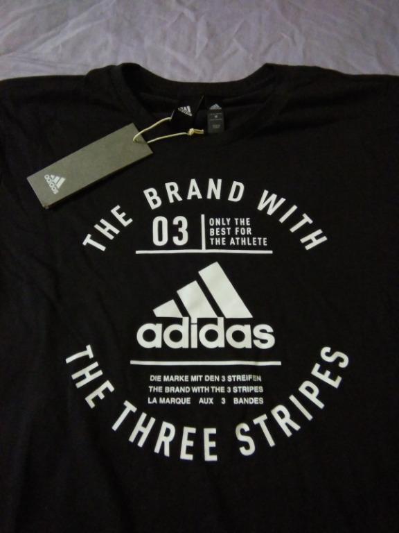 the brand with the 3 stripes shirt