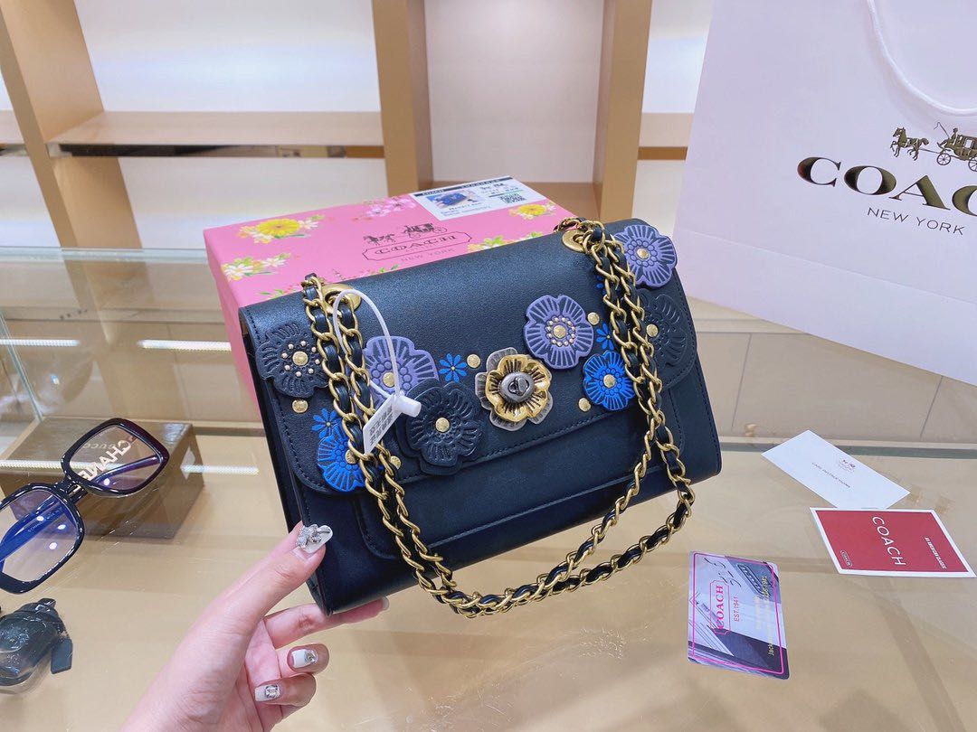 Coach bag with outlet flower applique
