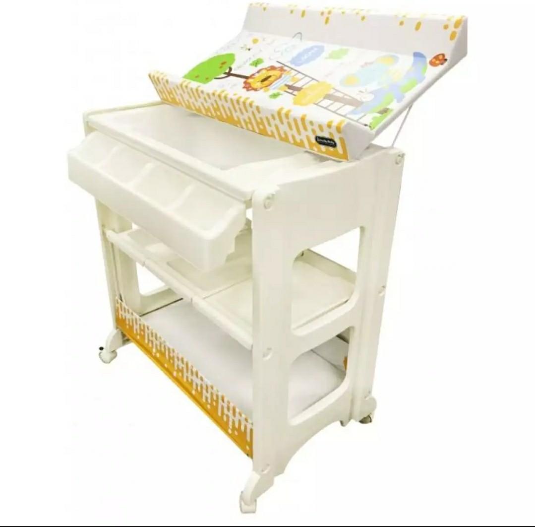 Baby changing table with bathtub