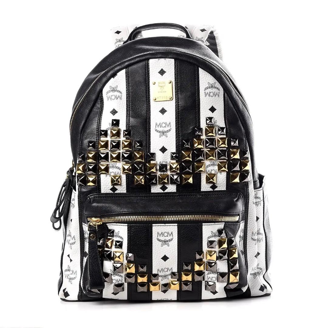 white and black mcm backpack