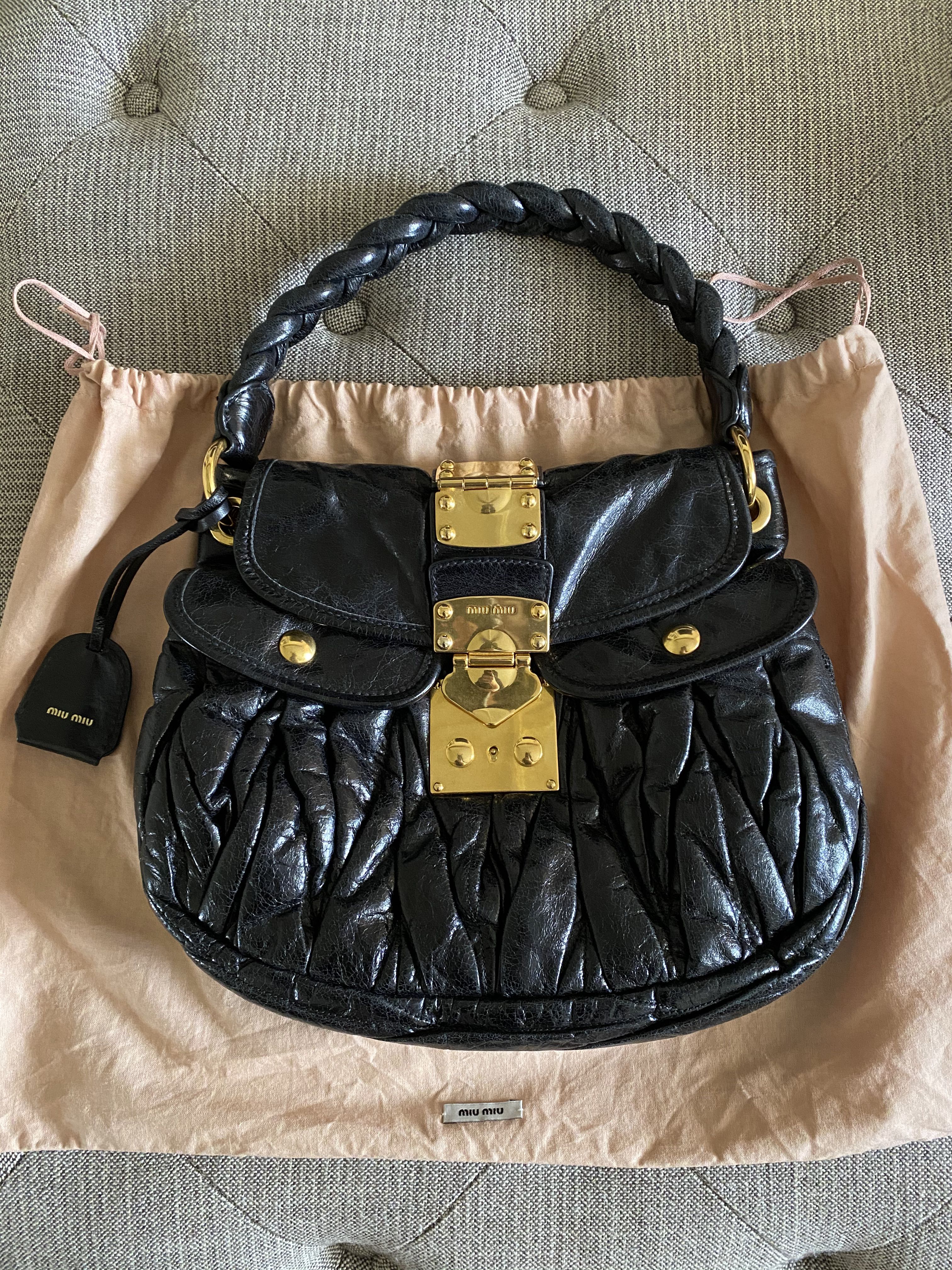 Coffer leather handbag Miu Miu Black in Leather - 30912826