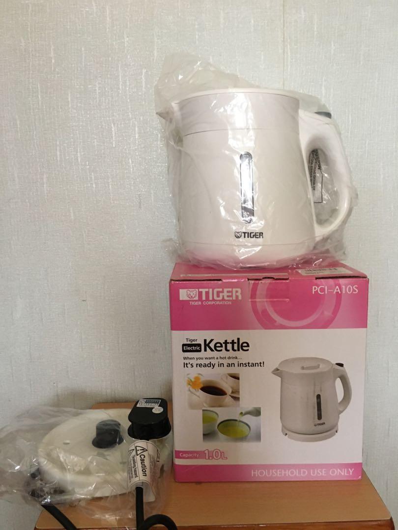 https://media.karousell.com/media/photos/products/2020/8/22/new__tiger___electric_kettle_1_1598113062_e849620f_progressive.jpg