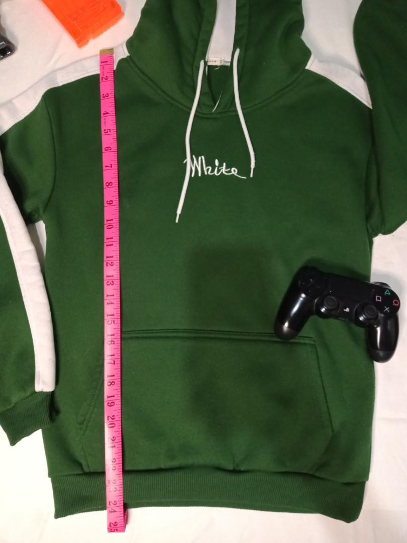 Fashion Hoodie (Category: Hoodies) located in Bacoor. Submitted by acm.cm (Listing ID 1030421111, Image 3). Description: Item is in very good condition, 9/10 Size : M Color : Green/White With front pocket.