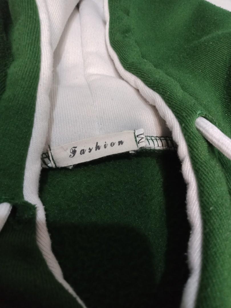 Fashion Hoodie (Category: Hoodies) located in Bacoor. Submitted by acm.cm (Listing ID 1030421111, Image 2). Description: Item is in very good condition, 9/10 Size : M Color : Green/White With front pocket.