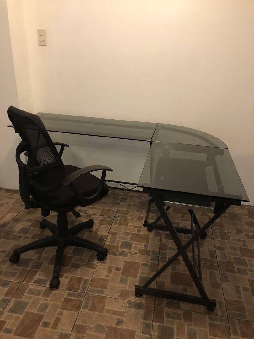 Office Tempered Glass Table with Chair (Category: Tables & Sets) located in Manila. Submitted by a.veloso (Listing ID 1030339247, Image 2). Description: Premium Tempered L shaped office/computer table Dimensions: long table Length 160 cm Computer table lenght:120 cm With sliding keyboard rack .