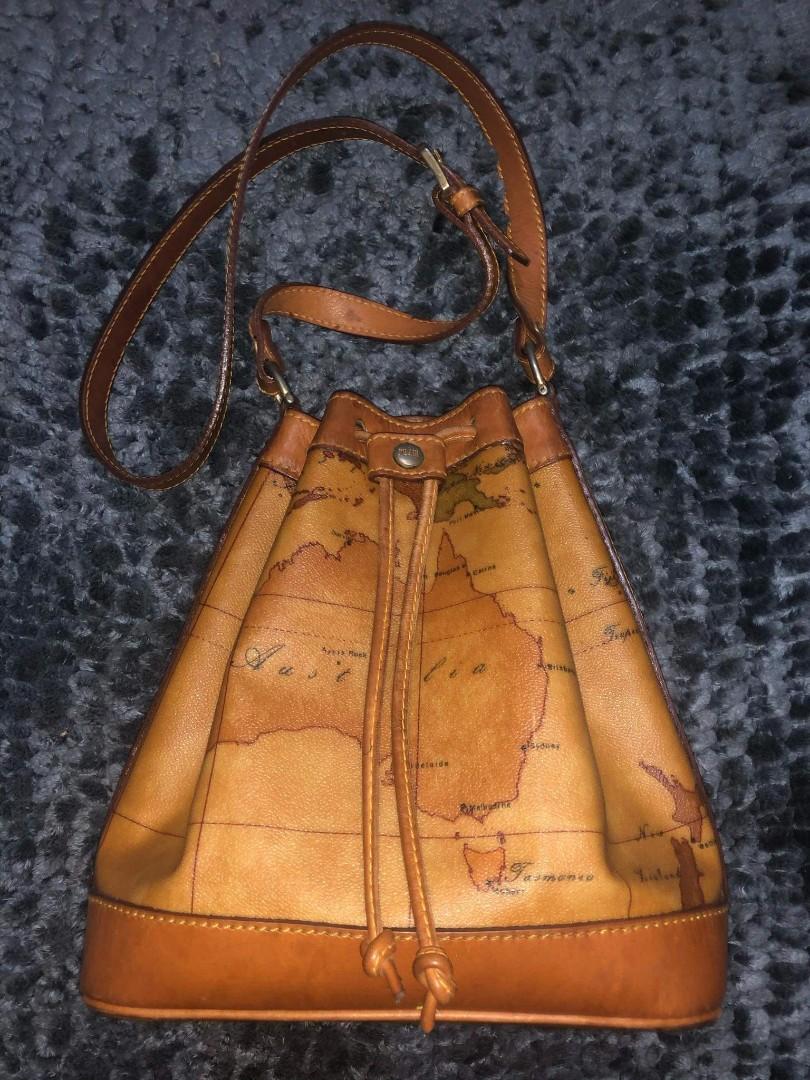Authentic Alviero Martini Bucket Bag (Category: Luxury Bags & Wallets) located in Quezon City. Submitted by lix12 (Listing ID 1030683016, Image 1). Description: ✔️Item Name : Prima Classe AM Bucket Bag ✔️ Made in Italy ✔️Colour : Brown ✔️Material : Coated Canvas ✔️Size : W14cm × H29cm × L30cm. ✔️Pocket : Outside >0 inside >1 Japan bought; #luvluxe.