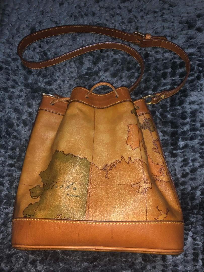 Authentic Alviero Martini Bucket Bag (Category: Luxury Bags & Wallets) located in Quezon City. Submitted by lix12 (Listing ID 1030683016, Image 2). Description: ✔️Item Name : Prima Classe AM Bucket Bag ✔️ Made in Italy ✔️Colour : Brown ✔️Material : Coated Canvas ✔️Size : W14cm × H29cm × L30cm. ✔️Pocket : Outside >0 inside >1 Japan bought; #luvluxe.