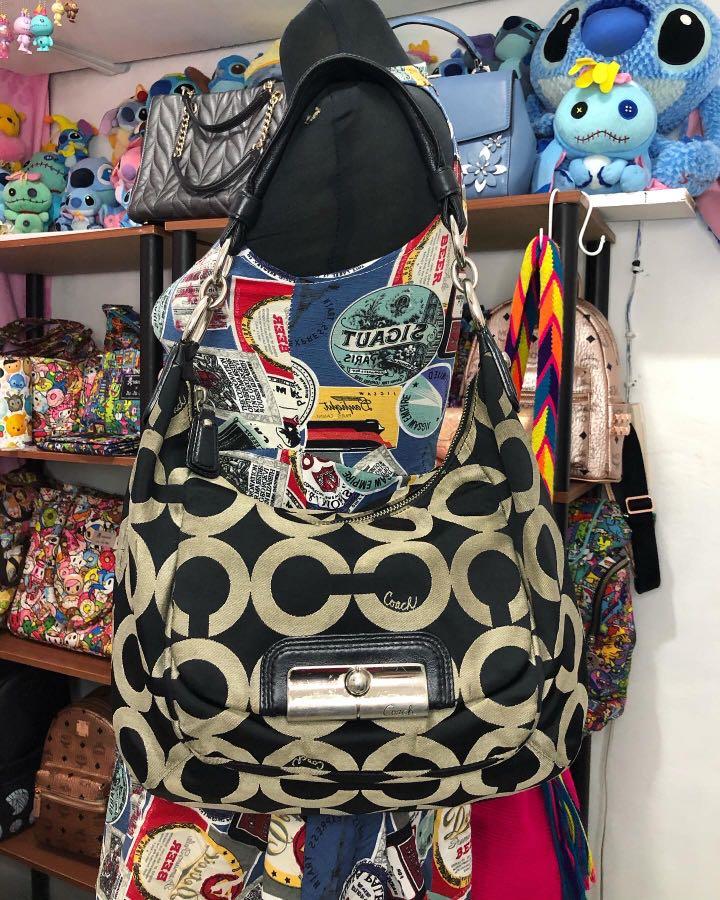Authentic Coach Hobo (Category: Purses & Pouches) located in Tuguegarao City. Submitted by khaid (Listing ID 1030724858, Image 1). Description: 100% Authentic kindly check photos for the flaw .