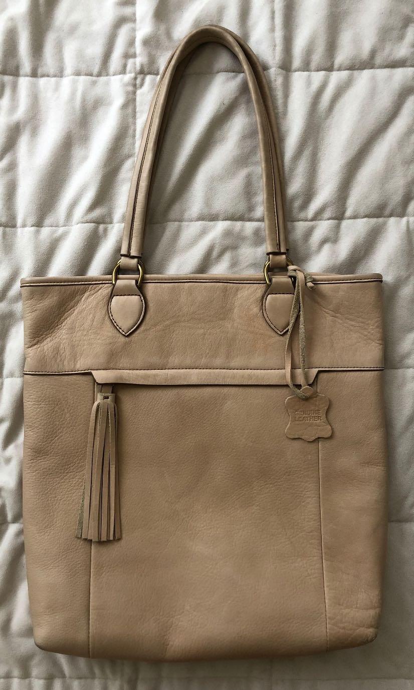 beige laptop bag