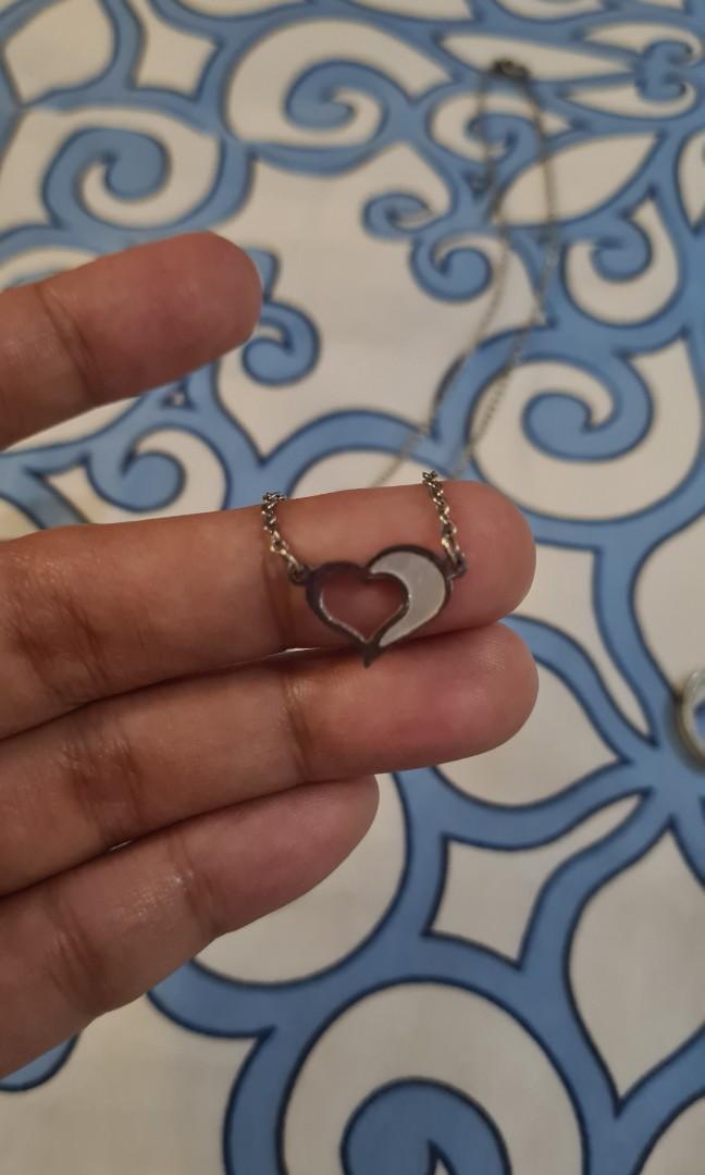 Stainless necklace and ring set (Category: Necklaces) located in Las Pinas. Submitted by annibeah (Listing ID 1030779776, Image 1). Description: °Selling my preloved stainless steel necklace and ring from imono. °Both has the MOTHER of PEARL stone (white part). °Ring size is 4.5-5 °Stainless jewelries do not tarnish unless user is very acidic. °RFS: no longer using these babies MOP: bdo/bpi/gcash.
