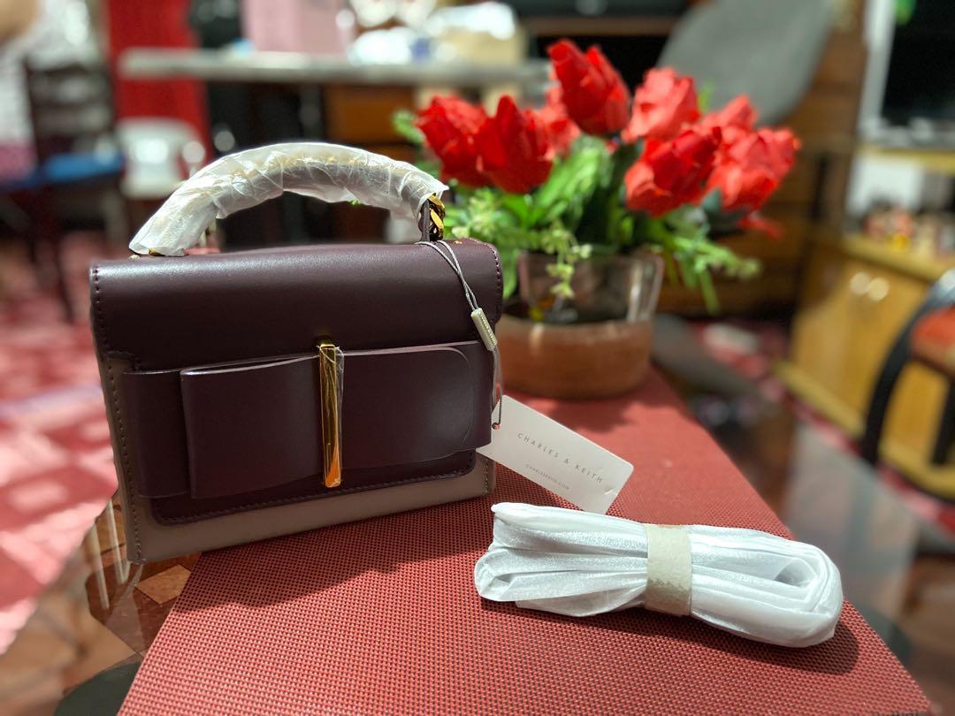 Bow buckle chain top 2025 handle bag