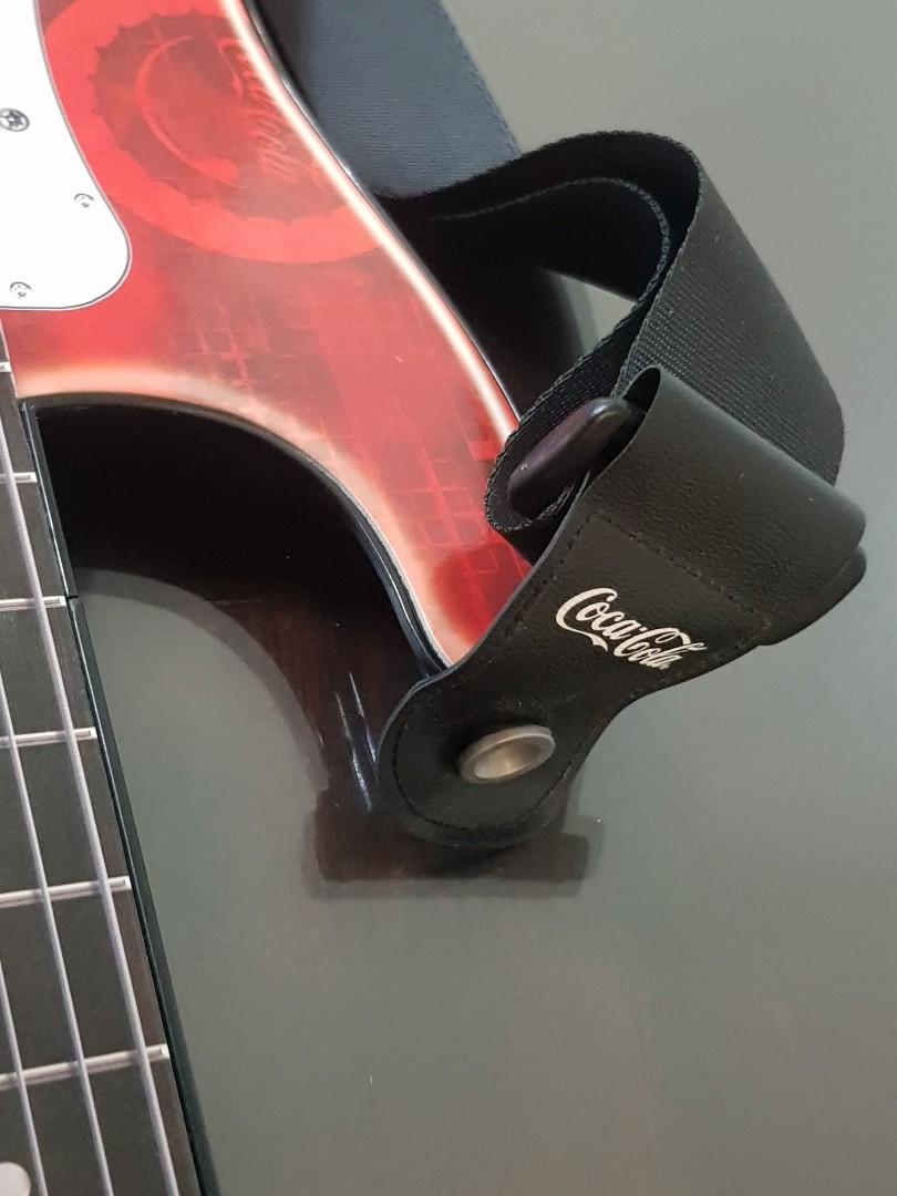 Coca-Cola Coke Electric Guitar (Category: Musical Instruments) located in Mandaluyong City. Submitted by urumikanzaki (Listing ID 1031230388, Image 3). Description: Battery Operated, 3 AAA. Built-in speaker still plays good sound and music. Not an actual guitar..