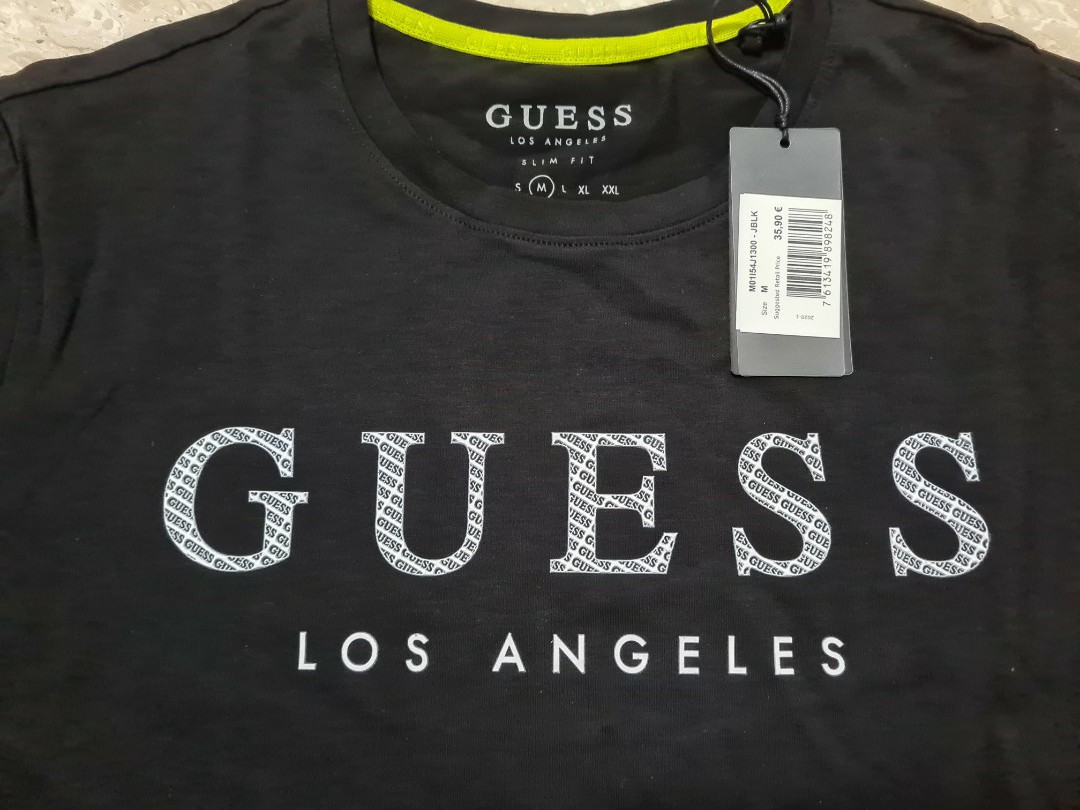GUESS black logo tee shirt, Men's Fashion, Tops & Sets, Tshirts Polo Shirts on Carousell