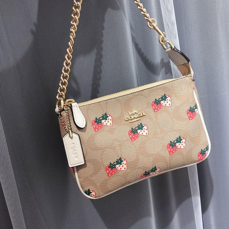 strawberry coach purse