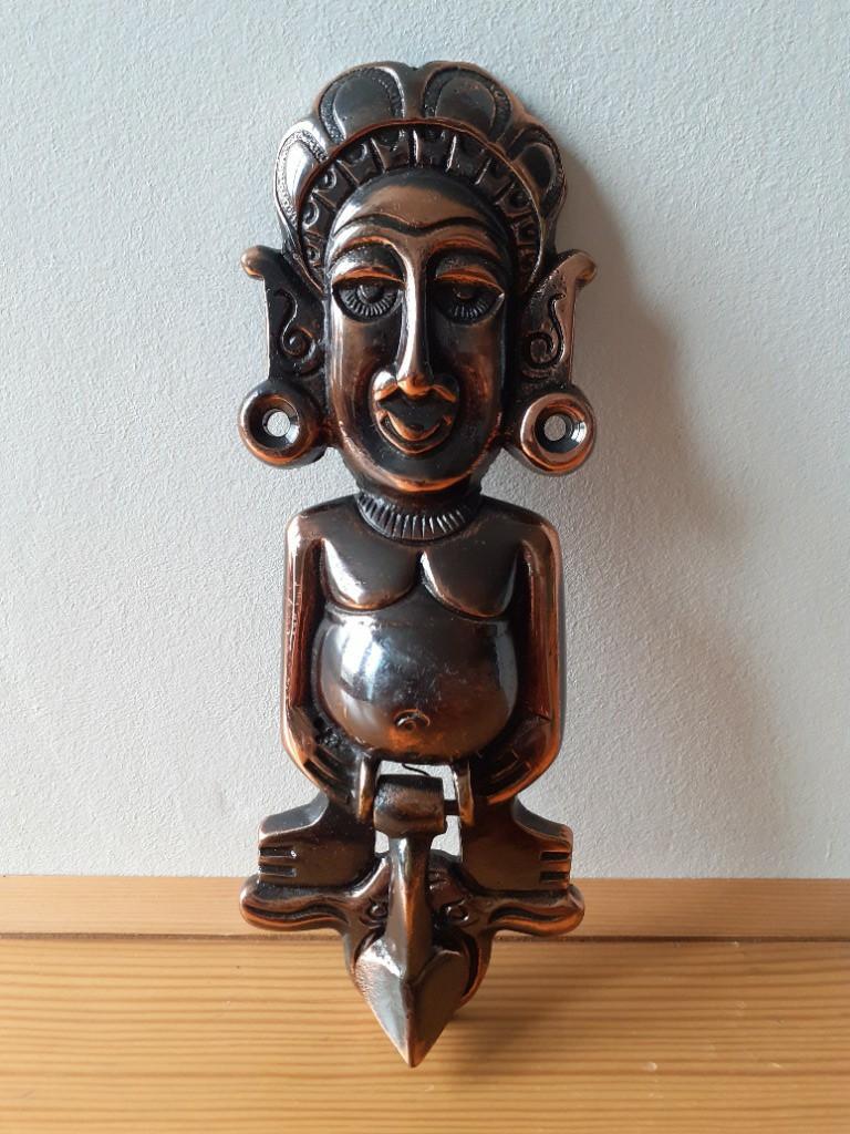 Hindu God Copper Toned Door Knocker (Category: Soil & Fertilisers) located in Paranaque City. Submitted by donjuan_thegreat (Listing ID 1031425276, Image 1). Description: Item in very good vintage condition, With spring mechanism on Penis of figure for knocking, Material: Iron Dimensions: H 15.5 cm, L 6cm, W 2.5 cm, comes with screws For pick-up in UPS 5 Paranaque or can ship at buyer's expense.