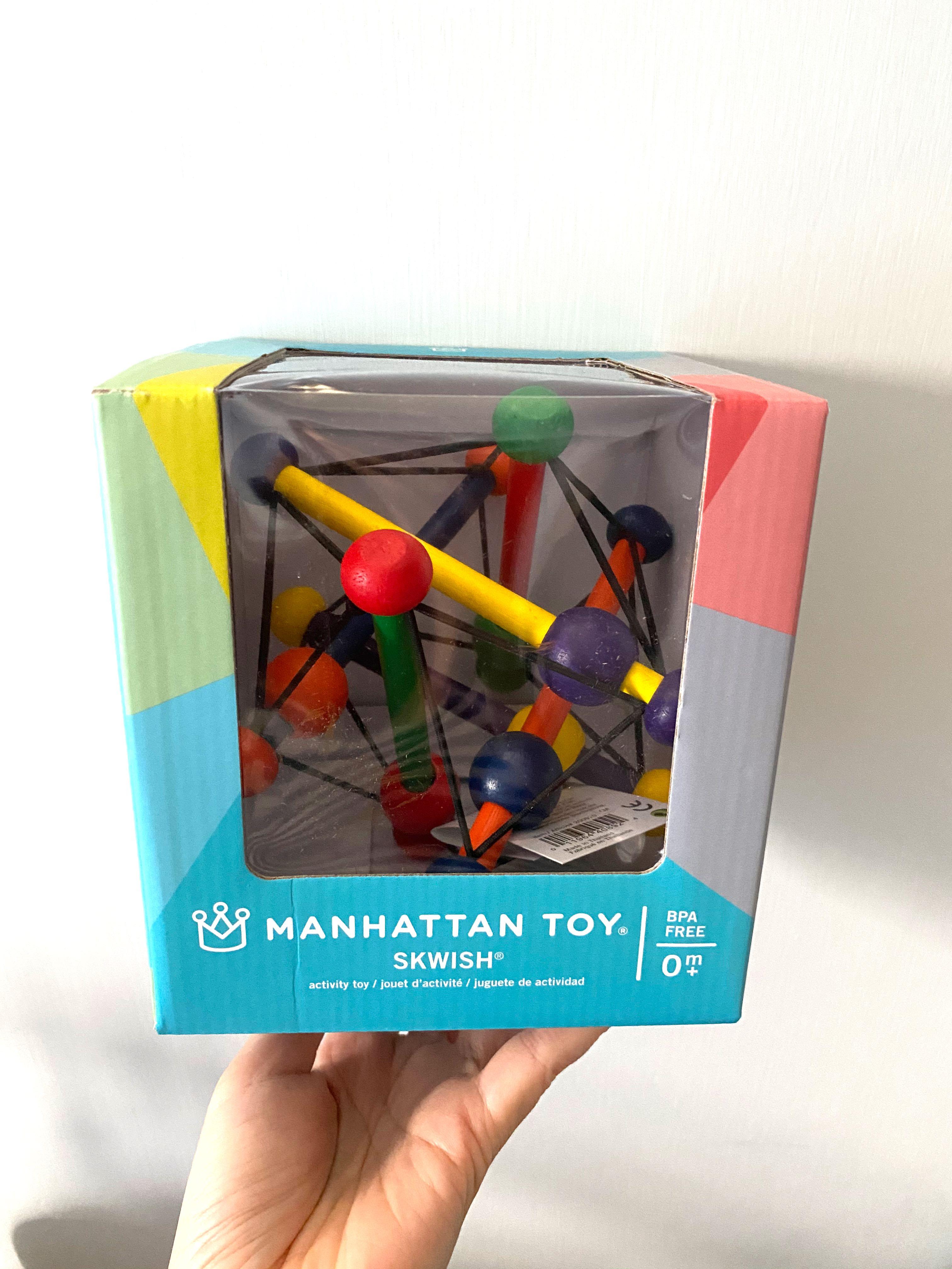 manhattan toy skwish classic rattle and teether grasping activity toy