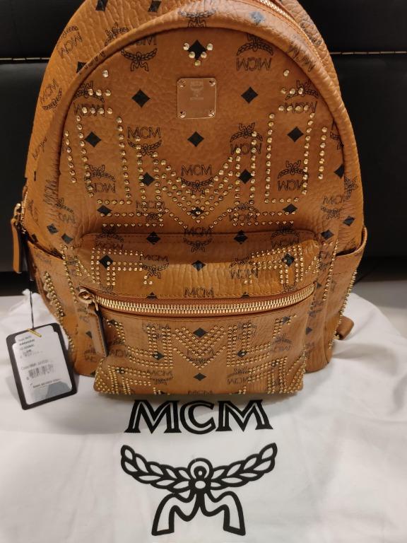 MCM Stark Backpack Visetos M Studs Medium Cognac in Coated Canvas