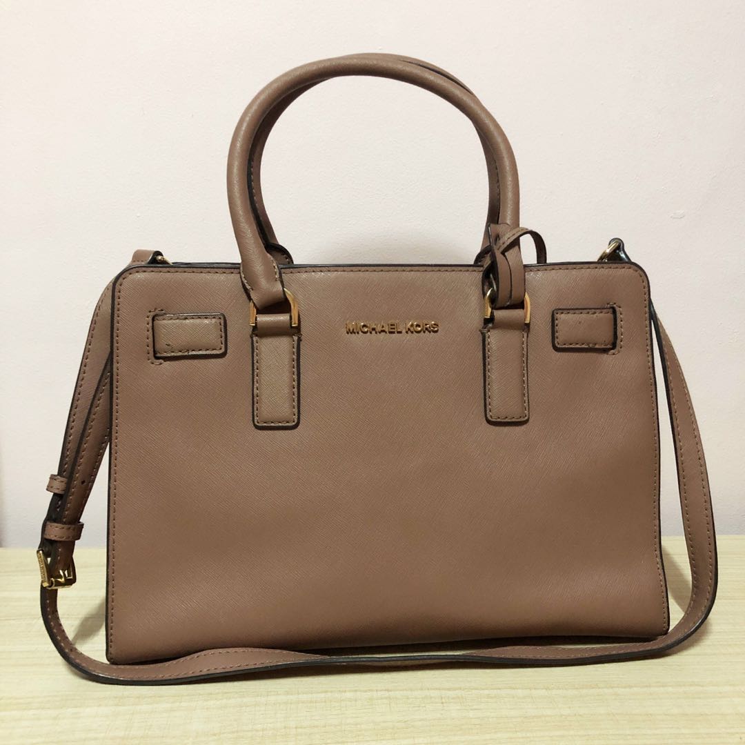 who carries michael kors handbags