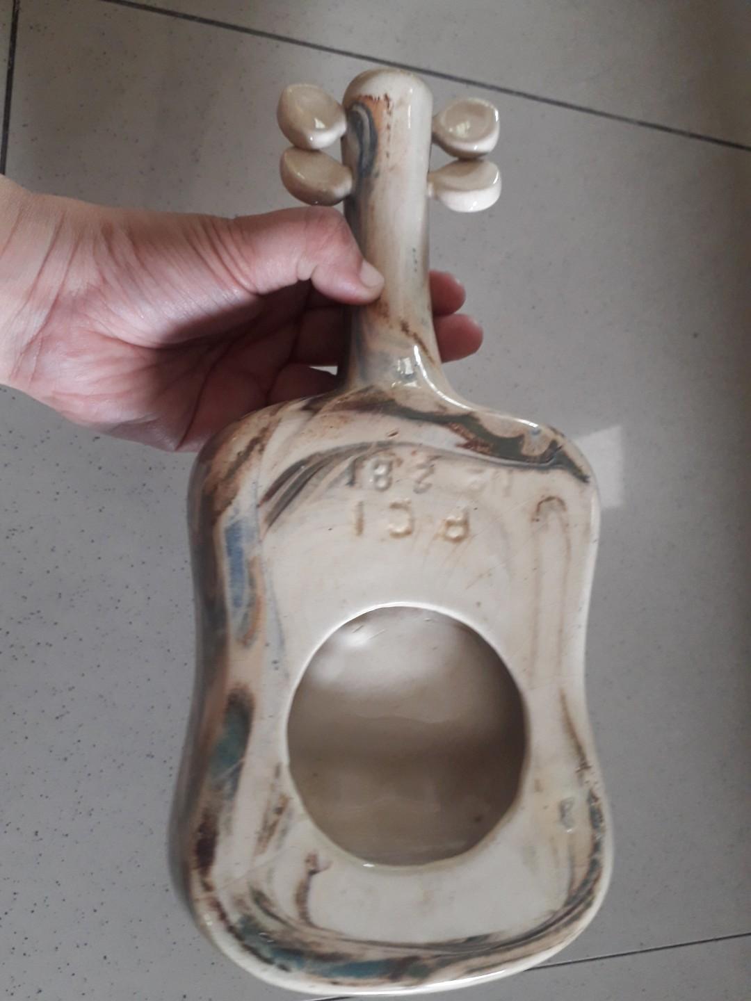 Vintage Ceramic Guitar Design Ashtray (Category: Other Kitchenware & Tableware) located in Quezon City. Submitted by lots2love (Listing ID 1031257441, Image 3). Description: Used vintage ceramic guitar design ashtray In good condition Location: Roxas District, QC.