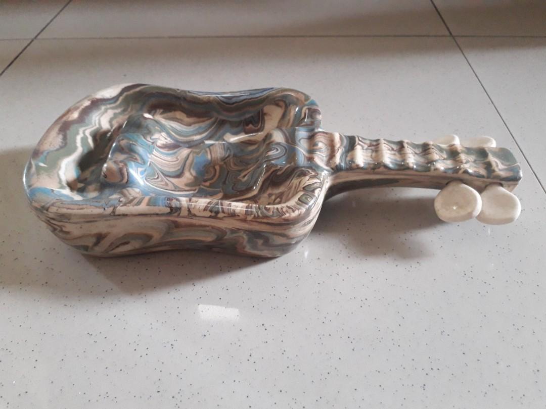 Vintage Ceramic Guitar Design Ashtray (Category: Other Kitchenware & Tableware) located in Quezon City. Submitted by lots2love (Listing ID 1031257441, Image 2). Description: Used vintage ceramic guitar design ashtray In good condition Location: Roxas District, QC.