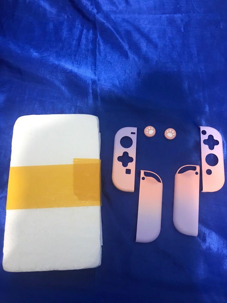 Nintendo Switch accessories (Category: Cases & Covers) located in Paranaque City. Submitted by deecluttershoppe (Listing ID 1031482776, Image 1). Description: Selling my Nintendo Switch accessories either in bundle or per item. Price as follows: Bundle - P1000 Paw thumb grip - P150 (slightly used) Joy controller cases (pink mix purple)- P550 Screen protector (brand new and sealed) - P210 Grey hard case (slightly used)- P250 SOLD! Detachable cryst