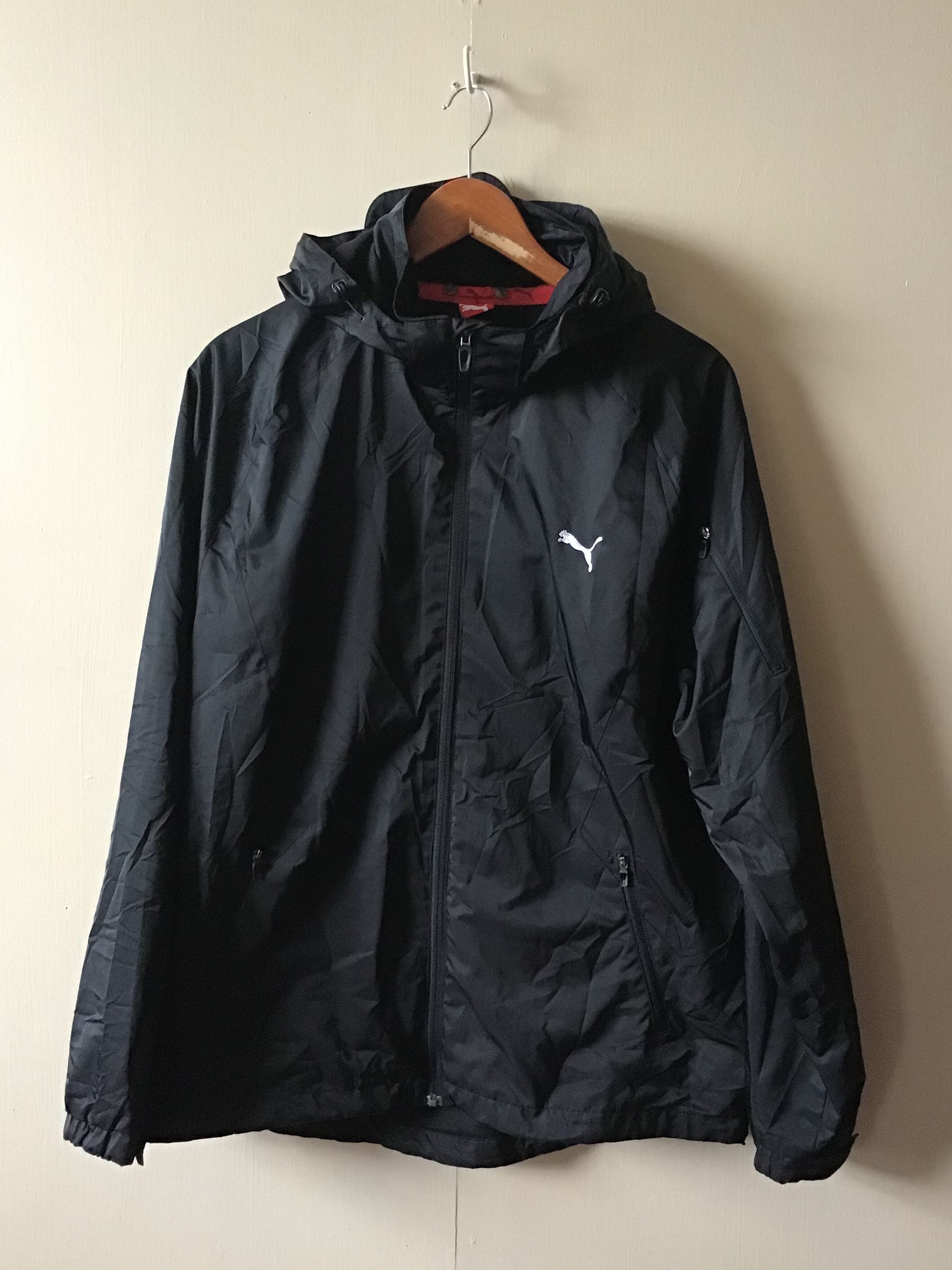 Black puma windbreaker sales