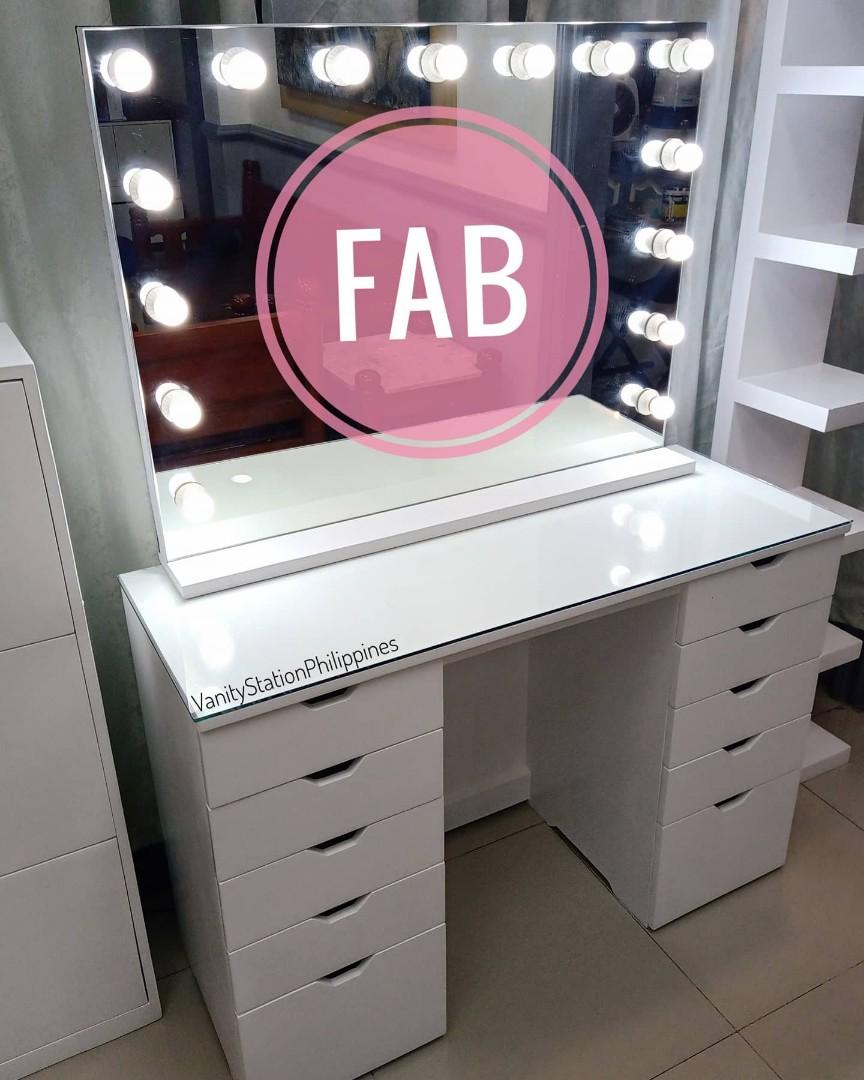 vanity mirror with lights and table set