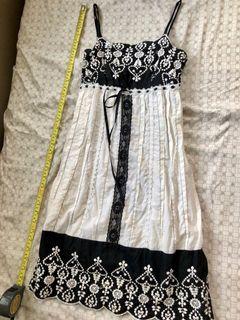 Black and off white dress with embroidery details