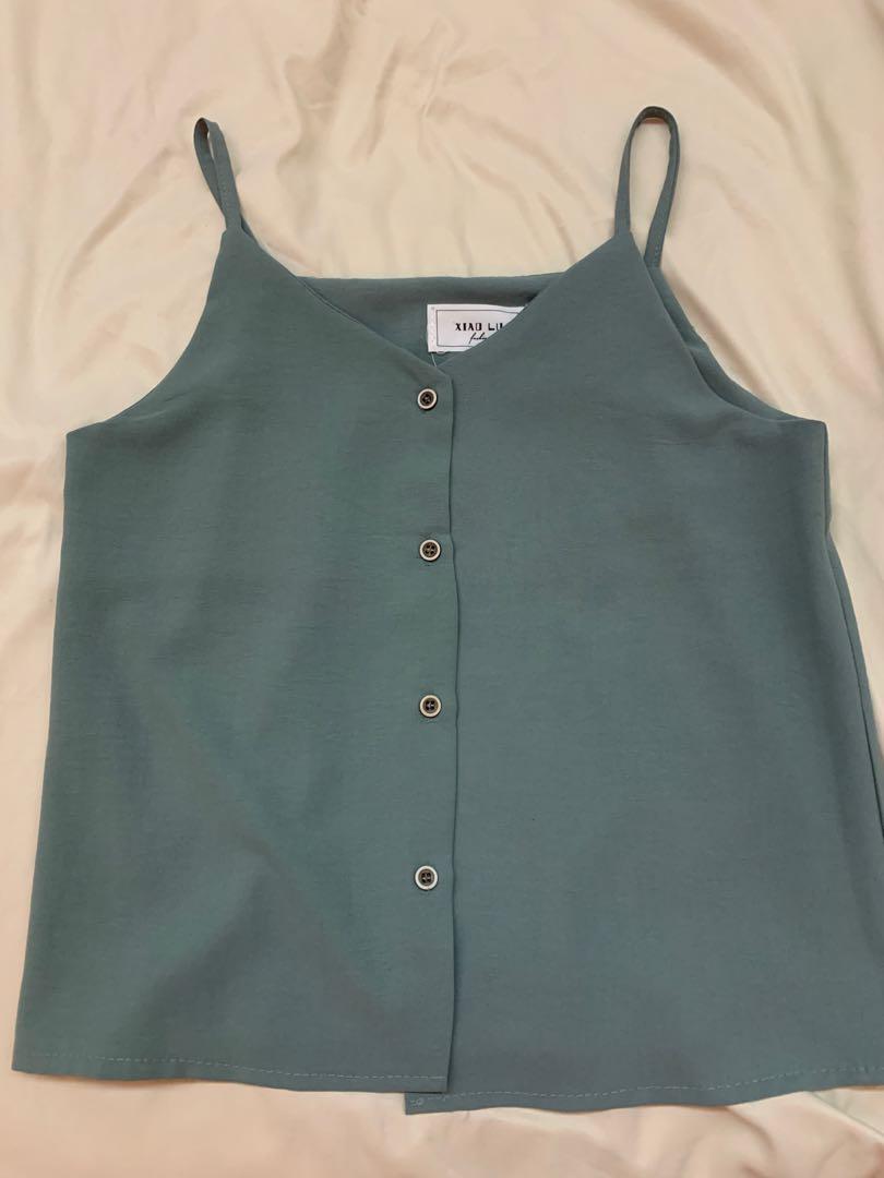 button down top (Category: Blouses) located in Singapore. Submitted by joyyamm (Listing ID 1031789002, Image 3). Description: all are brand new selling one for $5 super pretty piece,, can pair with almost anything selling cheap because i have a lot of the same pieces as well.