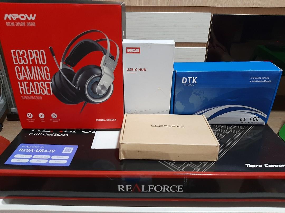 Computer Bundle (Category: Computer Parts) located in Singapore. Submitted by joian (Listing ID 1031852807, Image 1). Description: 1) Realforce R2SA-US4-IV Mechanical keyboard made in Japan. 2) RCA USB- C HUB 3) MPow EG3 Pro Gaming Headset 4) Elecgear NV-C01 external drive casing without SSD. 5) DTK Power cable for most laptop model. If you agree to the price I will add in 2-3 more item. Negotiable but reasonable price. No lowballing..