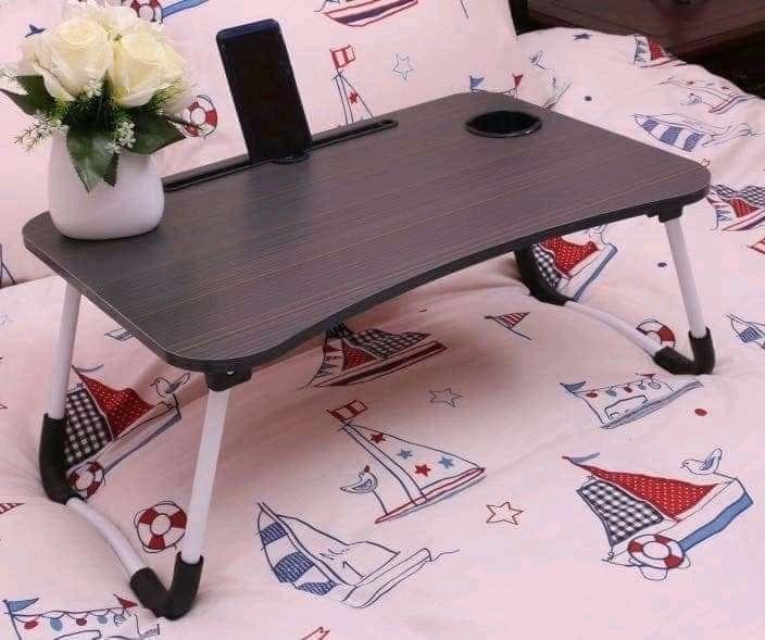 ✨ Foldable Laptop Table ✨ (Category: Tables & Sets) located in Manila. Submitted by affordshopz (Listing ID 1025719213, Image 2). Description: ✨ Foldable Laptop Table ✨ - COD ❌ 399.00 before ~ ✅₱350.00 NOW! ⭐₱290 if 2pcs up Work From Home? Studying? This is what you need! Affordable and in Good Quality Cash On Delivery ( COD ) is also available.