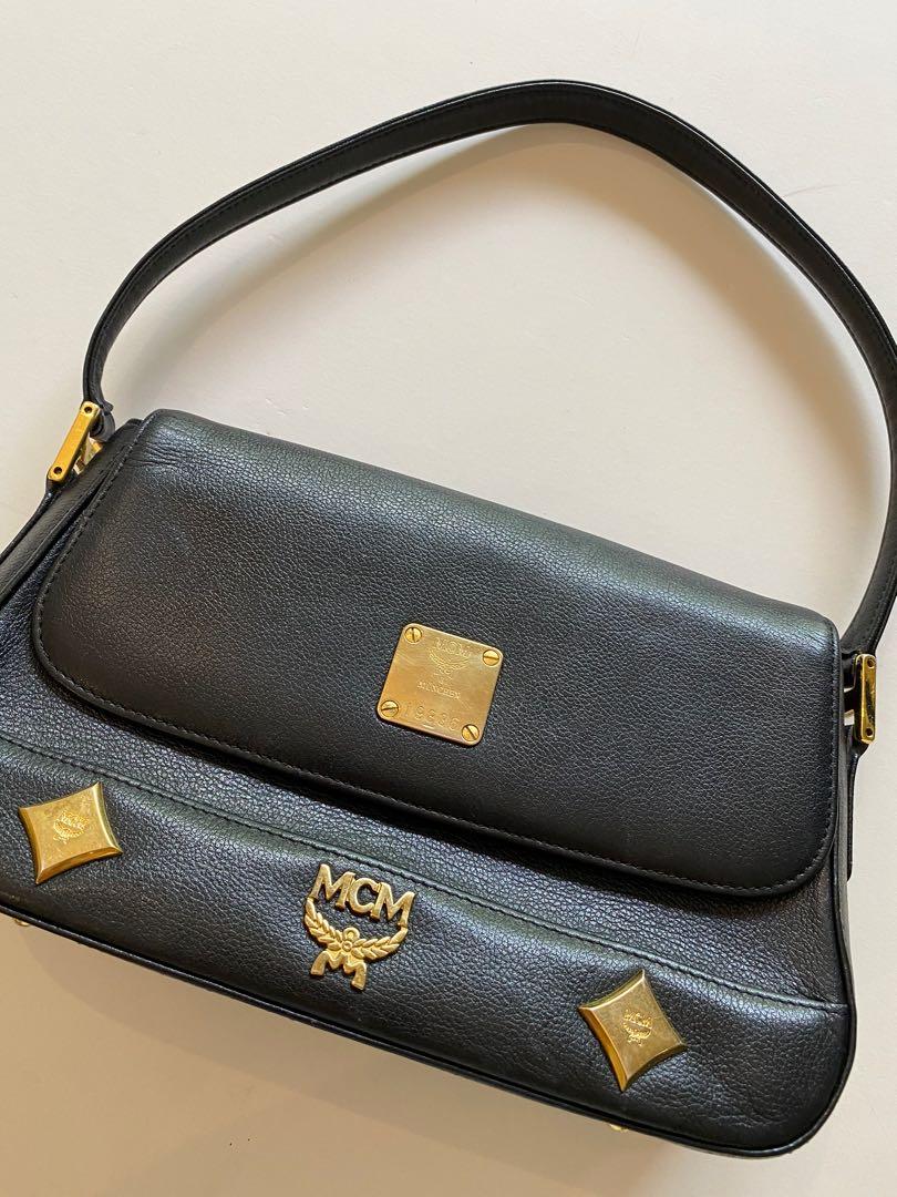 Authentic MCM (Category: Luxury Bags & Wallets) located in Paranaque City. Submitted by mypurselove (Listing ID 1025247979, Image 3). Description: Black leather extended Shoulder bag Minimal signs of use Clean inside out Signs of use (seldom) .