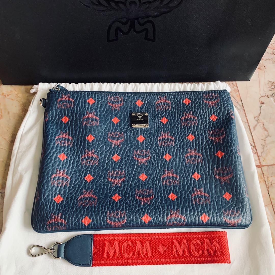 MCM Clutch Bag, Luxury, Bags & Wallets on Carousell