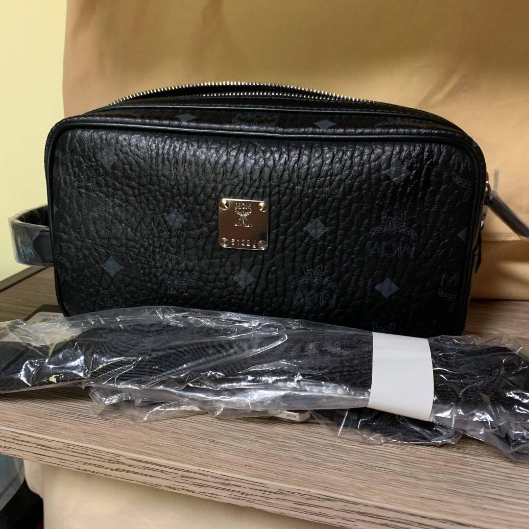 MCM Clutch Bag, Luxury, Bags & Wallets on Carousell