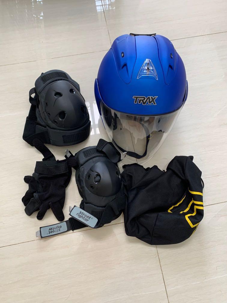 Blue motorbike helmet gloves elbow and knee pads Motorcycles