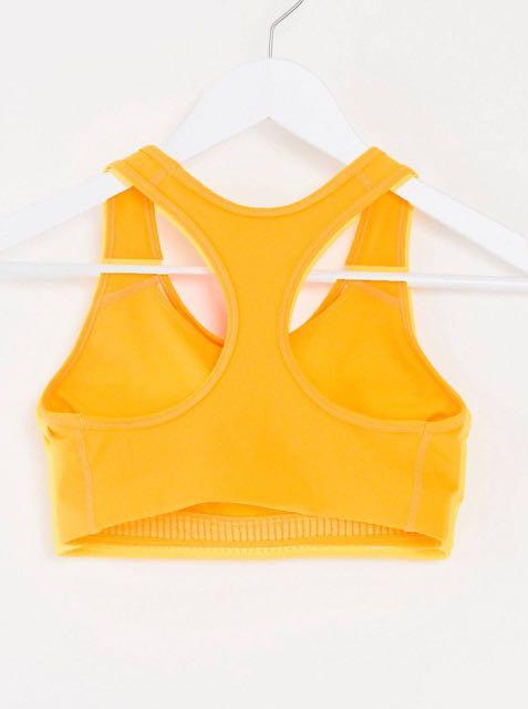 Nike training swoosh bra in yellow online