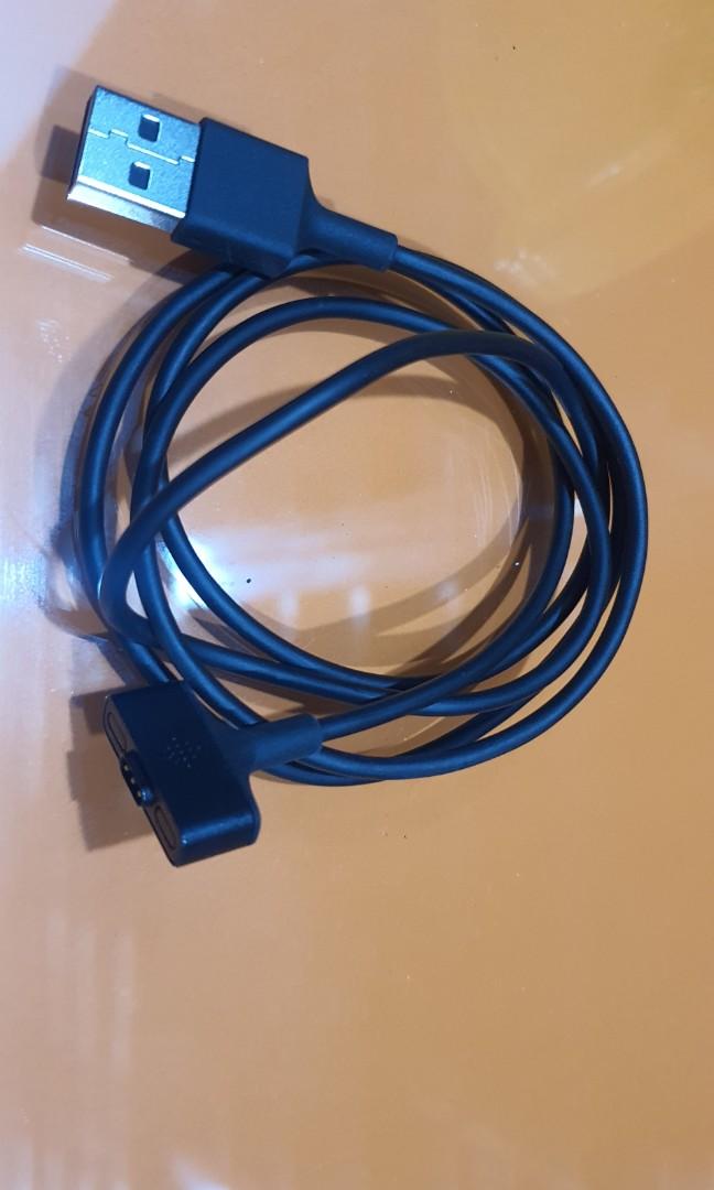 Fitbit Ionic charging cable (Category: Chargers & Cables) located in Singapore. Submitted by oddfire.609f2a (Listing ID 1032304880, Image 1). Description: Charging cable for Fitbit Ionic.