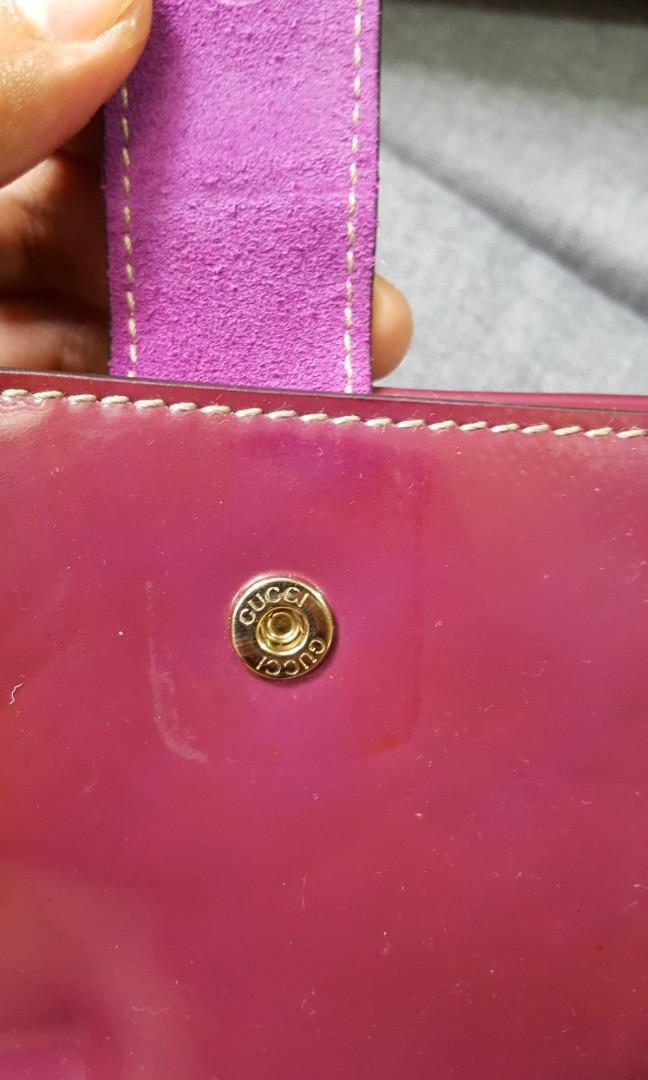 Gucci patent wallet with bow detail (Category: Luxury Bags & Wallets) located in Baguio. Submitted by lotus_blossom (Listing ID 1032184213, Image 2). Description: coded see stains and mark on patent leather no other flaws.