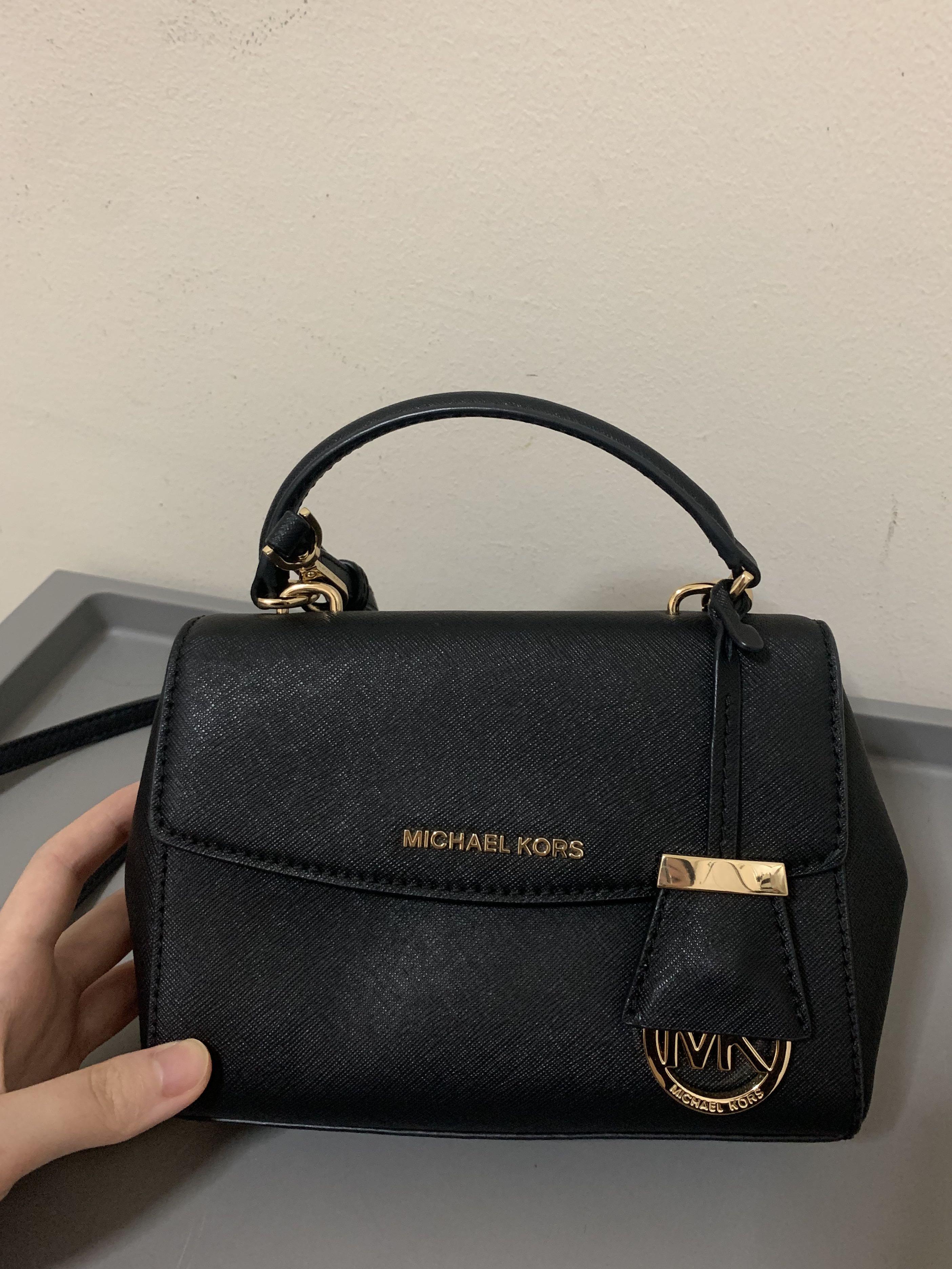 michael kors sling handbags