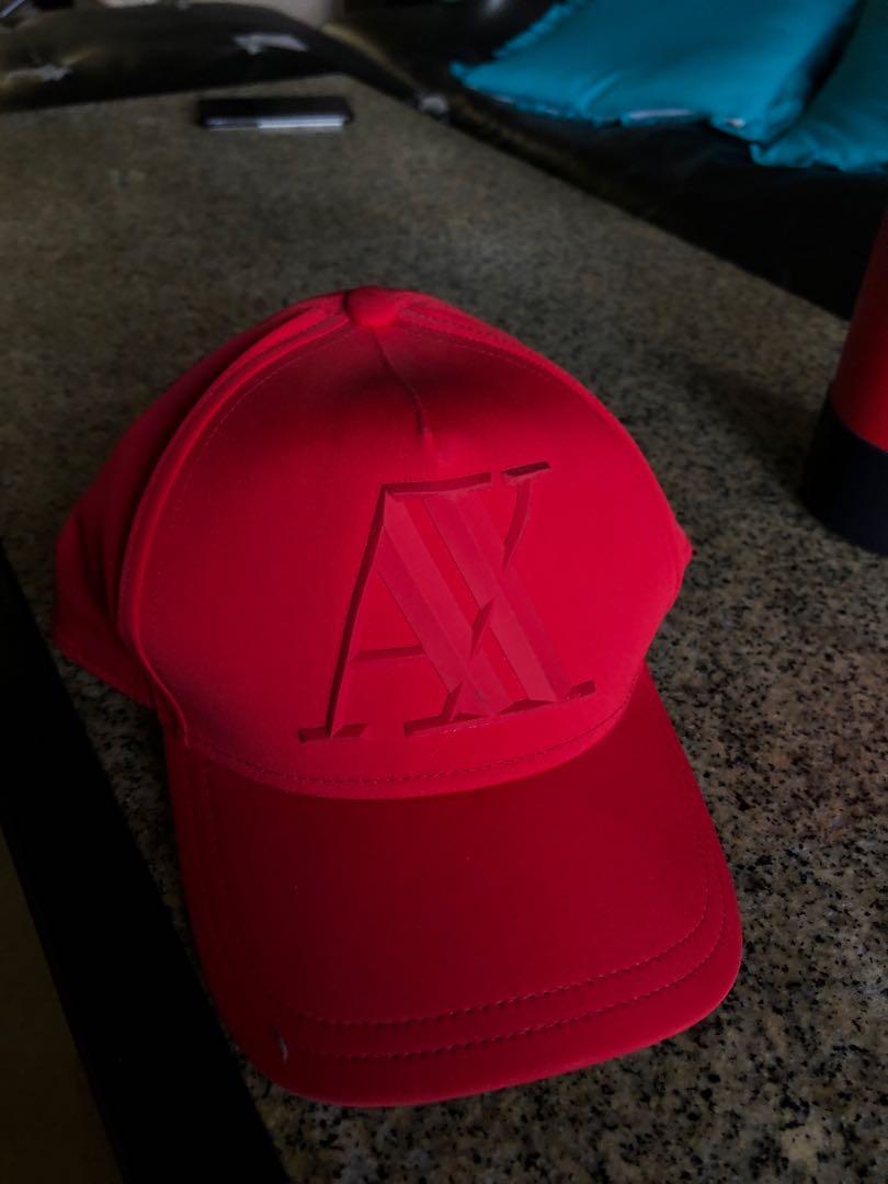 Original Armani Exchange red cap, Men's Fashion, Watches & Accessories, Caps  & Hats on Carousell