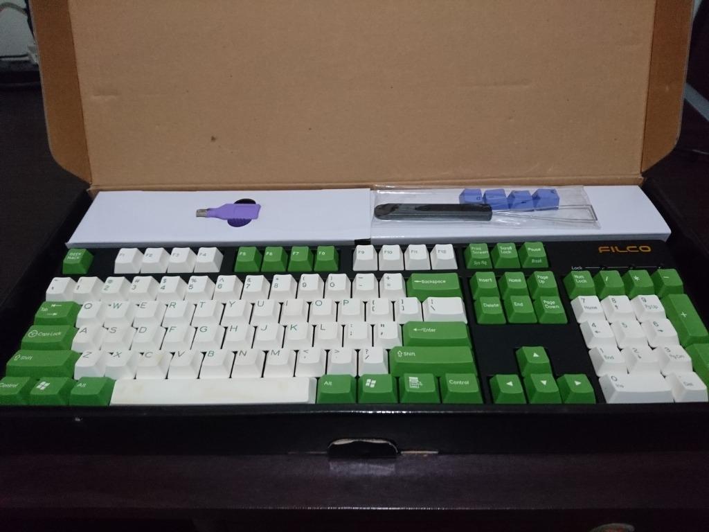Filco Majestouch 2 Mechanical Keyboard (Category: Computer Keyboard) located in Pasig City. Submitted by ken_san (Listing ID 1026001532, Image 2). Description: Filco Majestouch 2 104-key full sized mechanical keyboard: MX Red switches w/ Geek Hack keycaps (cream cheese & green). Barely used; backup unit only. Shipping to be shouldered by the buyer..
