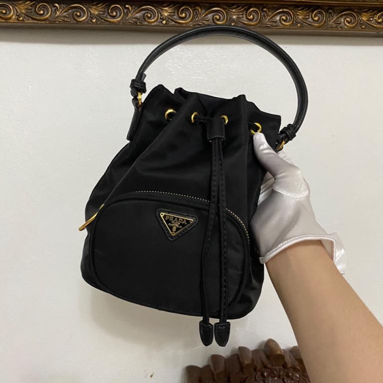 Prada nylon bucket bag SALE, Luxury, Bags & Wallets on Carousell